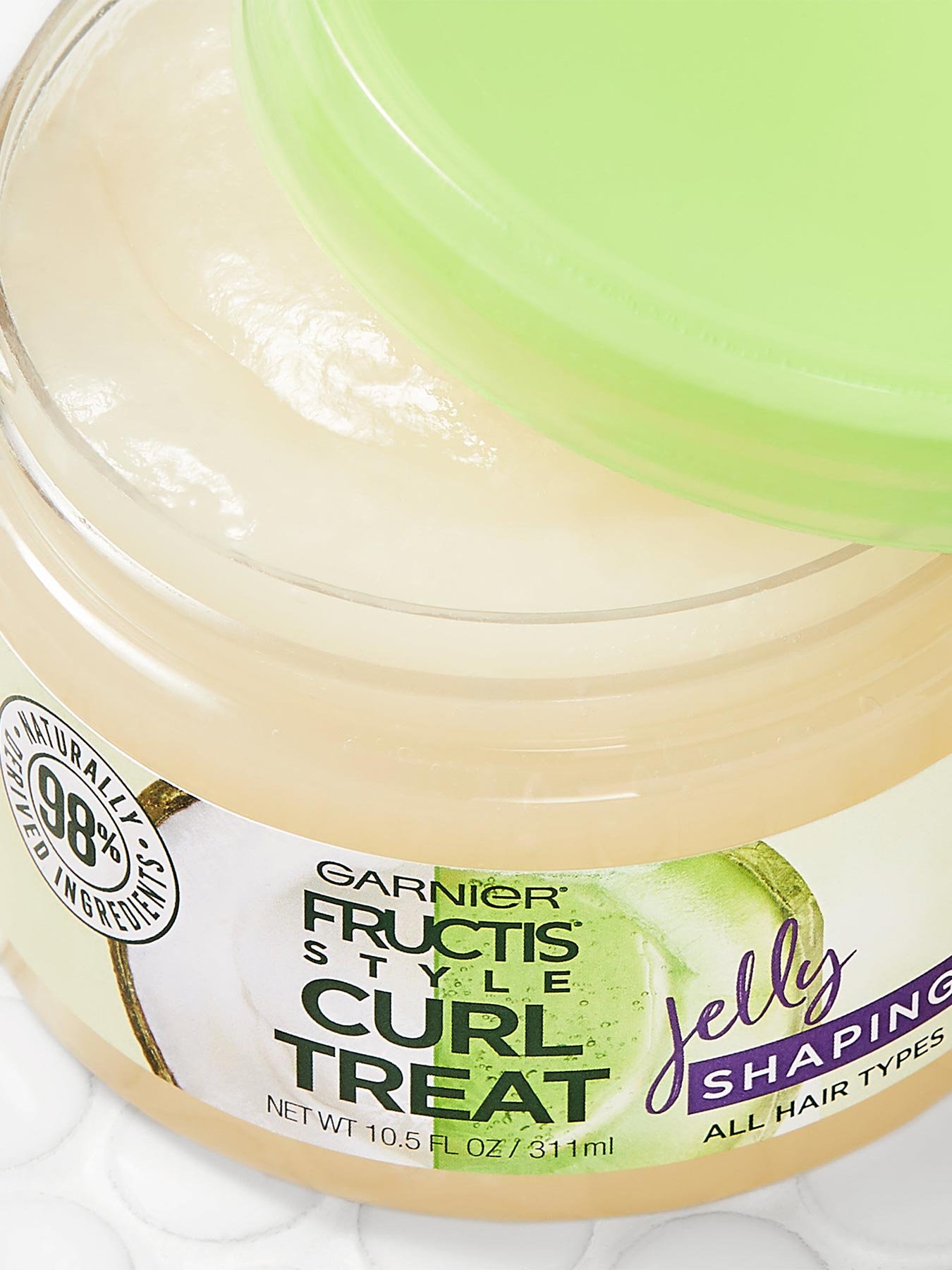 Close up view of Curl Treat Jelly Shaping Leave-in Styler to Shape Curls.